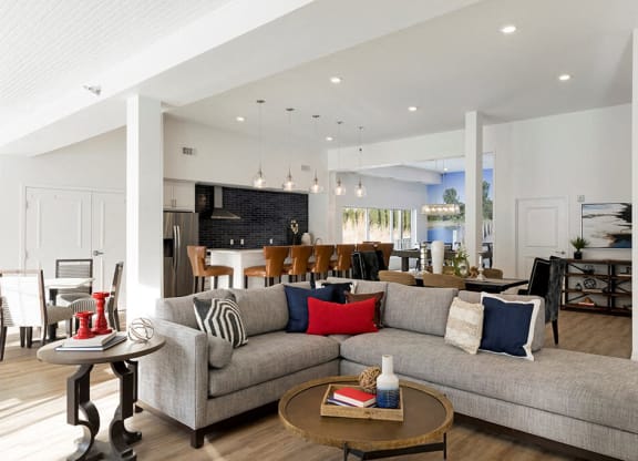 Bright clubroom with large grey sectional at Waterstone Place in Minnetonka, MN 55305