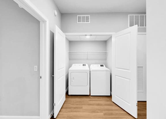 A laundry room with a washer and dryer.