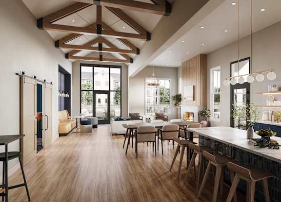 Open concept kitchen and dining area with vaulted ceilings at Wildwood Lakeville Apartments, Minnesota