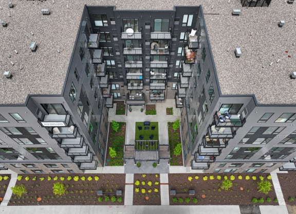 a birdseye view of a large apartment building