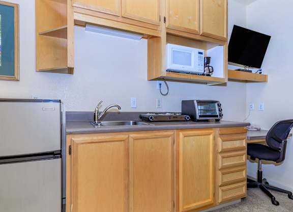 A Kitchen With a Fridge at Atrium Garden Apartment Homes, LLC, California, 95112