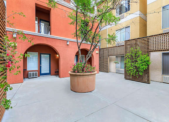 A Courtyard With a Planter In The Middle at Atrium Garden Apartment Homes, LLC, California, 95112