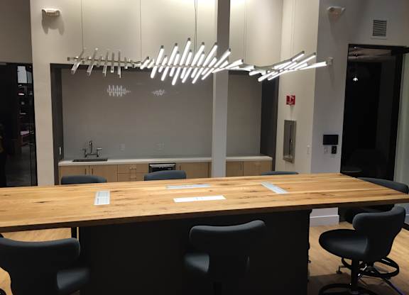 A conference room with a long table and chairs at Catalyst Mountain View, Mountain View, CA