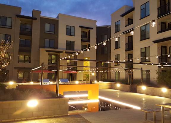 A building with a lit up walkway in front of it at Catalyst Mountain View, Mountain View