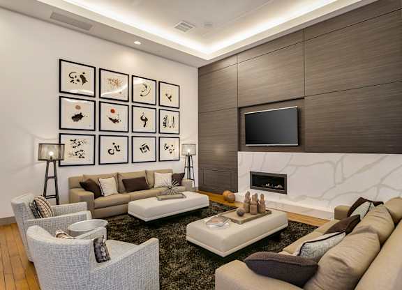A modern living room with a fireplace and a TV. at Cirrus Redwood City Apartments, Redwood City, CA, 94061