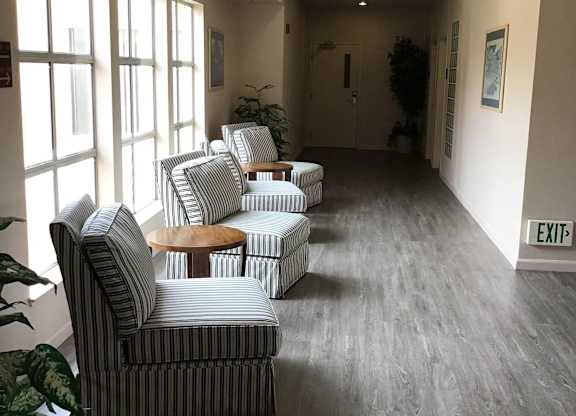 A Room With Striped Chairs at Atrium Garden Apartment Homes, LLC, San Jose, CA, 95112