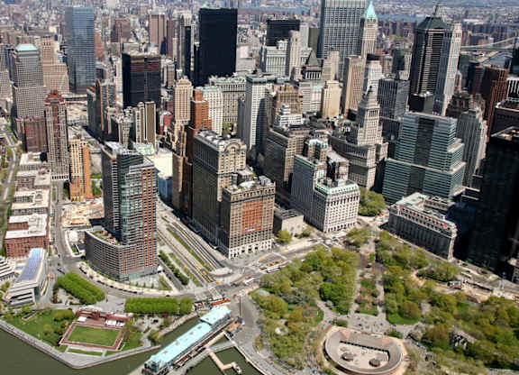 A cityscape with a large body of water in the foreground at One West, New York, New York
