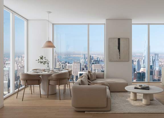 A modern living room with a view of the cityscape.