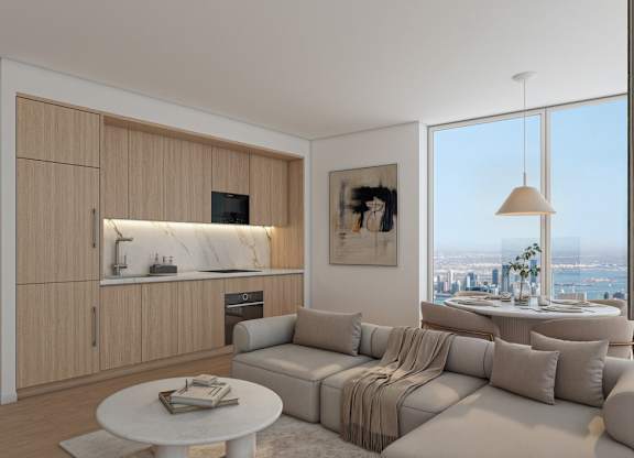 A modern living room with a large window overlooking the city.