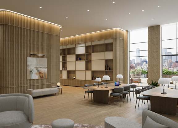 A modern living room with a large window overlooking the city.
