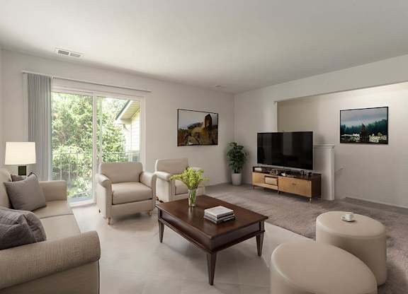 a living room with a couch a table and a television