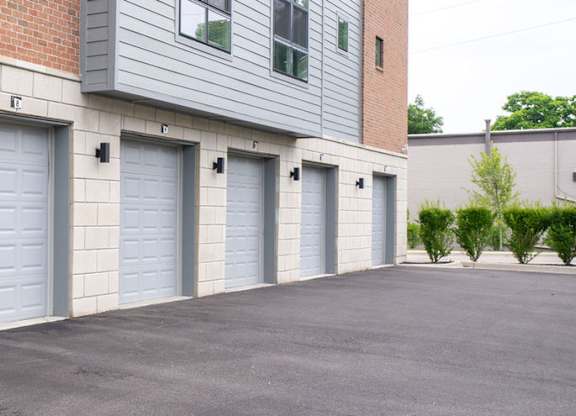 A row of garage doors are closed.