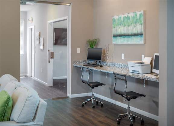 a home office with a desk and a computer