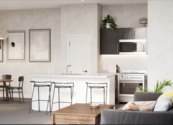 A modern kitchen with a dining table and chairs.