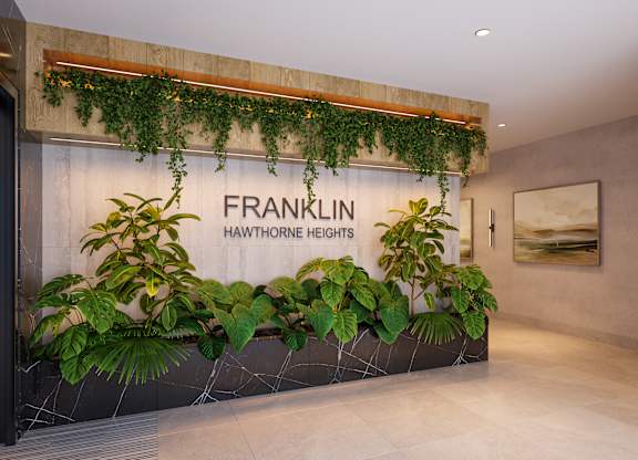 A wall of green plants hangs over a sign that says "Franklin Hawthorne Heights.".