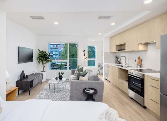 a living room with a couch and a table