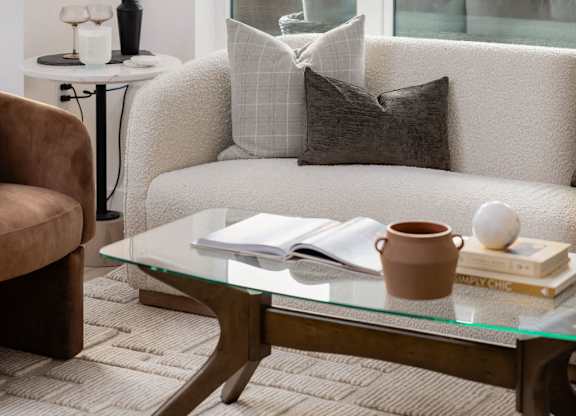 a living room with a couch and a coffee table