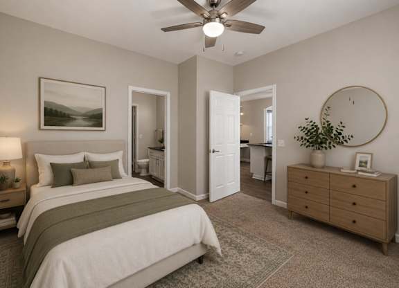A bedroom with a bed, nightstand, and a painting on the wall.