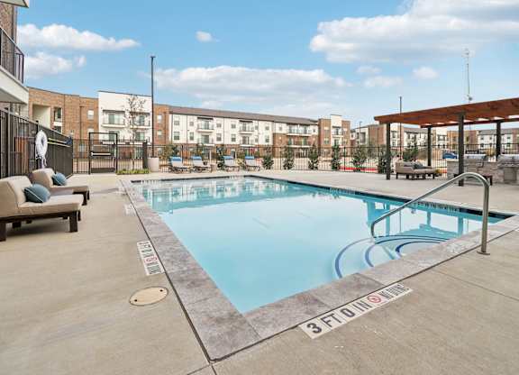 A swimming pool with the number 3 on the ground.