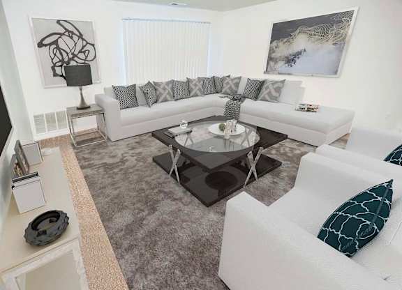 a white living room with couches and a table