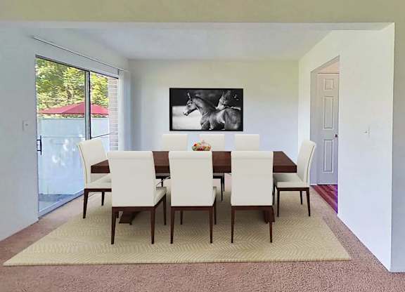 A dining room with a table and chairs.