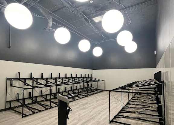 A room with many secure bike racks