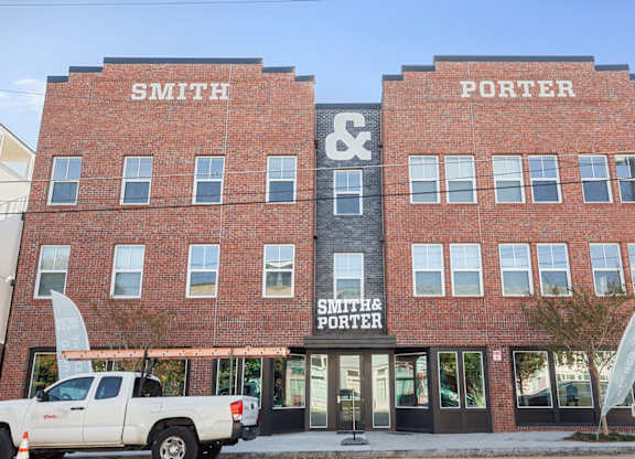 A red brick building with the words Smith Porter on it.