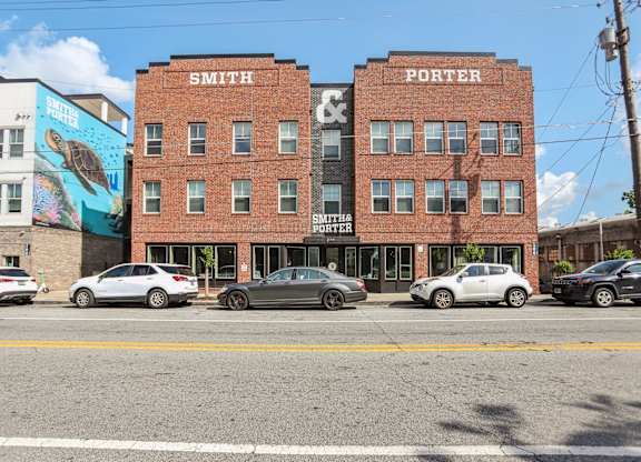 A street view of a building with the sign