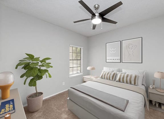 a bedroom with a bed and a ceiling fan at Heatherstone, Dallas, TX, 75287