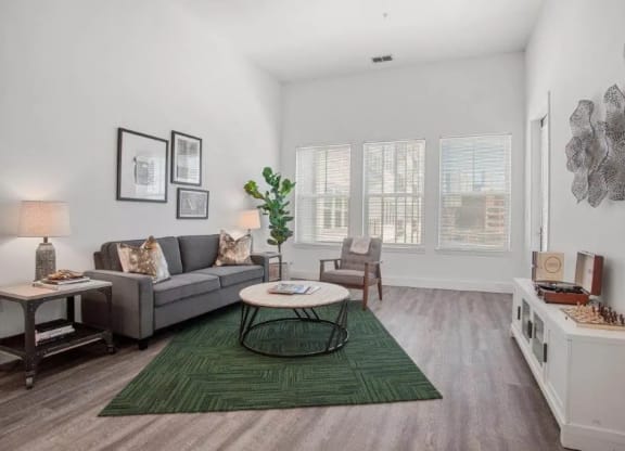 a living room with a couch and a table at Smith and Porter, Georgia, 30313