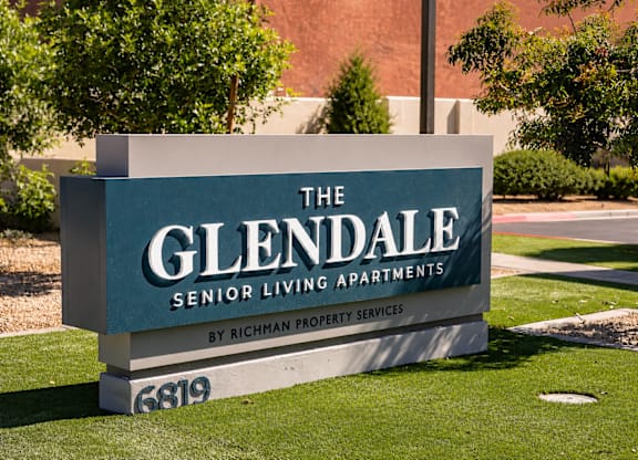 A sign for The Glendale Senior Living Apartments by Richman Property Services.
