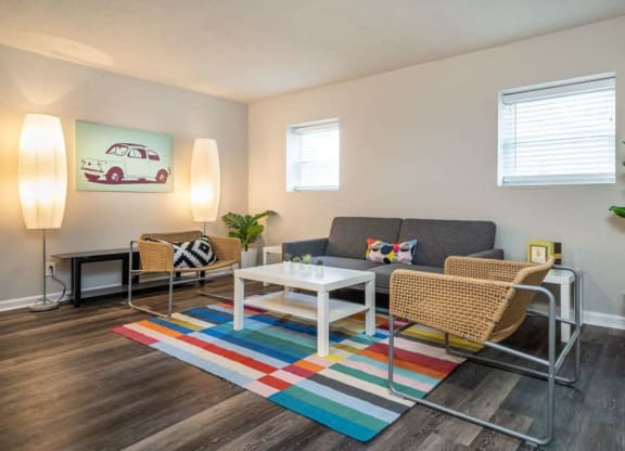a living room with a couch and a coffee table at Viceroy Apartments, North Carolina