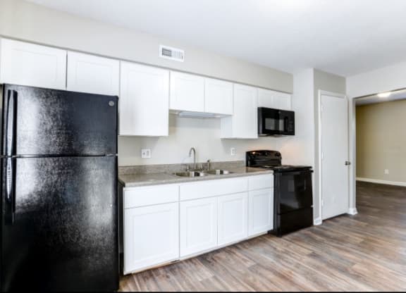Black Appliances at Trails Corner Apartments, Raleigh