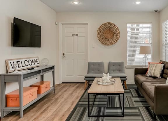 Living Room With TV at Aspen Landing, Kansas City, MO