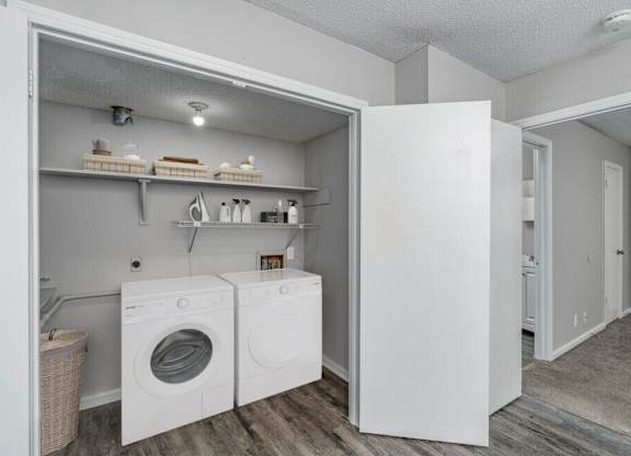 A laundry room with a washer and dryer.