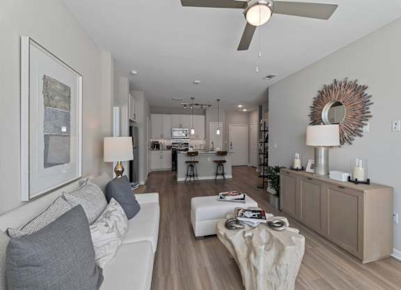 Living Room with a White Couch at Citadel at Westpointe Apartments, Texas, 78245