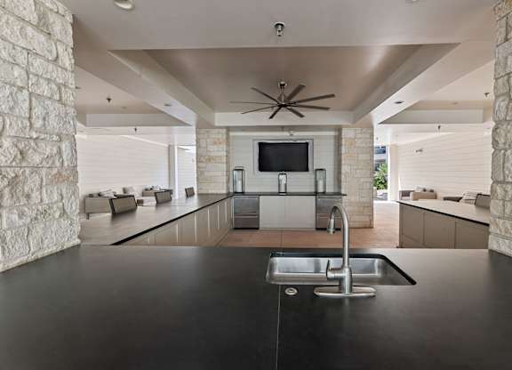 Kitchen with a Ceiling Fan at Citadel at Westpointe Apartments, San Antonio, TX, 78245