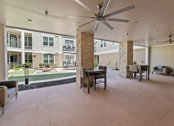 A Patio with a Ceiling Fan at Citadel at Westpointe Apartments, San Antonio, TX
