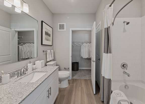 Bathroom with a White Tub at Citadel at Westpointe Apartments, San Antonio, TX