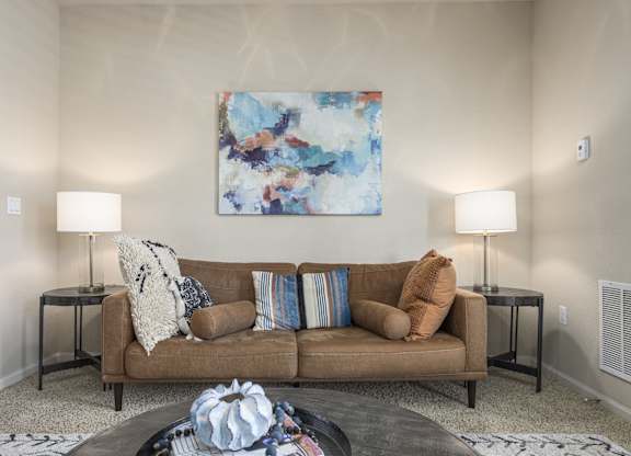 Living Room with a Brown Couch at Spring Creek Apartments, Crestview, Florida