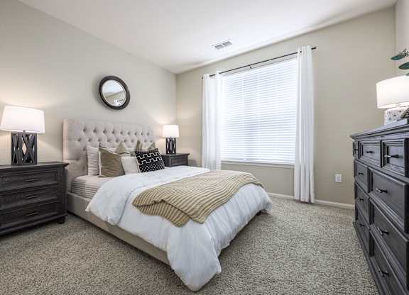 Bedroom With Expansive Windows at Spring Creek Apartments, Florida, 32536