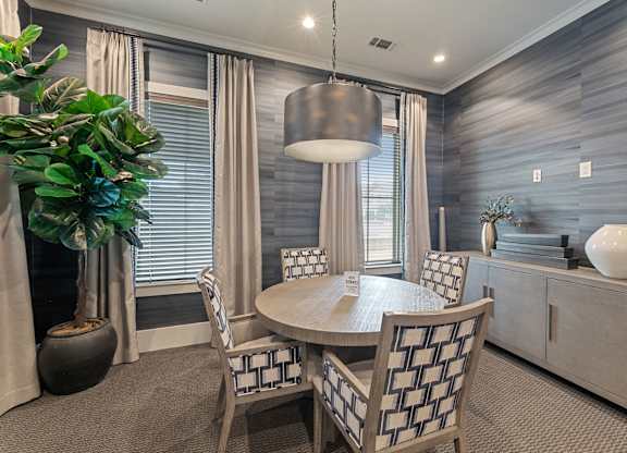 Dining Room with a Round Table at Citadel at Westpointe Apartments, Texas