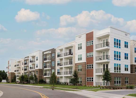 Apartment building with balconies and multiple stories at Hudson at Renaissance Apartments, Wilmington, North Carolina