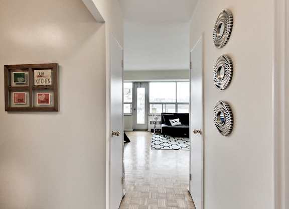 A hallway with a sign that says