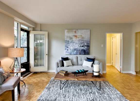 a living room with a couch and a coffee table