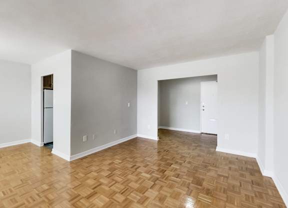 a empty room with a wooden floor