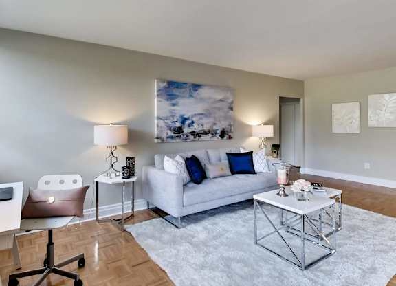 a living room with a couch and a table