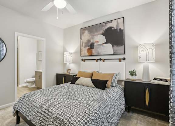 a spacious bedroom with an ensuite bathroom