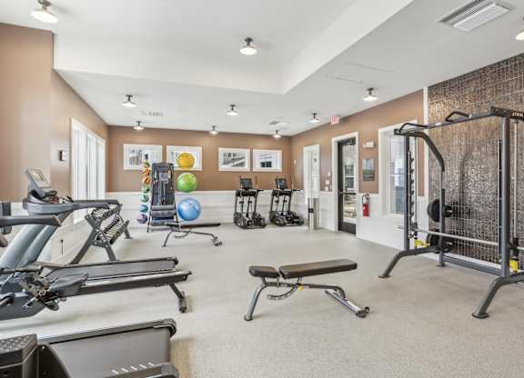 a 24-hour fitness center with cardio and weight machines