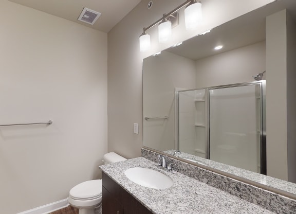 Bathroom with dual sinks, shower